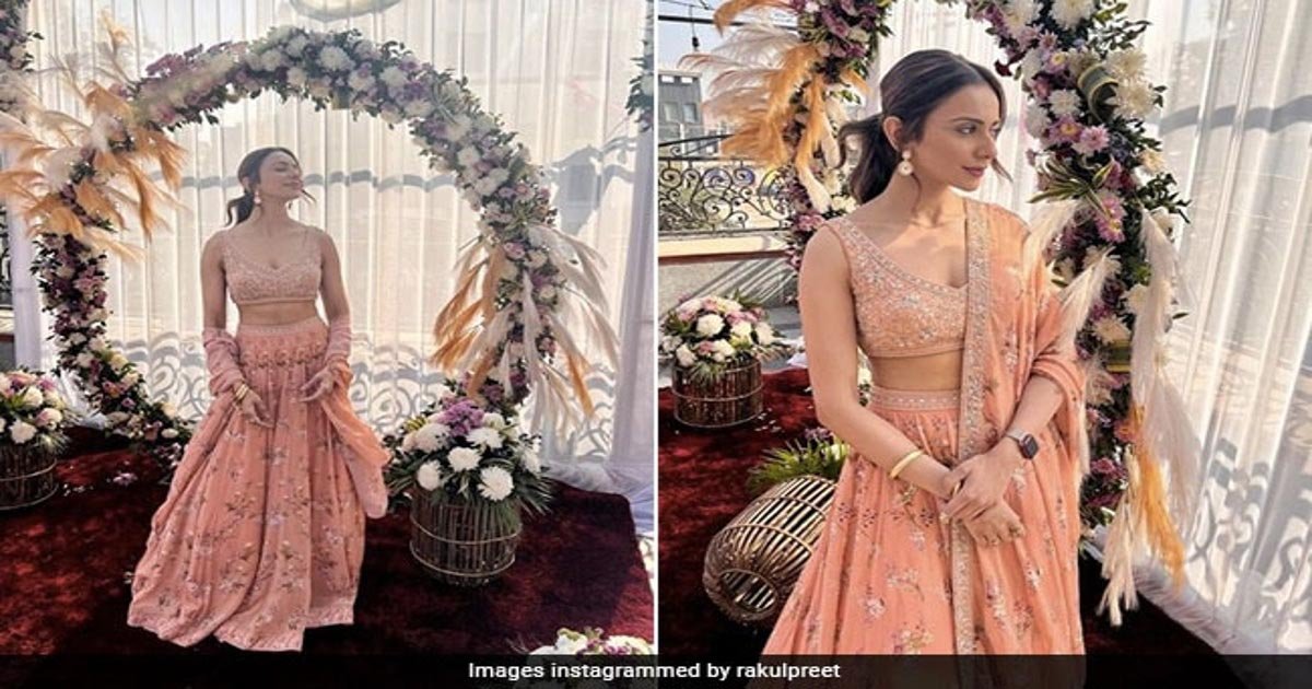 Elegant lehenga looks by Rakul Preet Singh in a pastel peach embroidered lehenga at a wedding event – bridal fashion inspiration 2025. Image Credit: Instagram @rakulpreet.